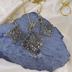 نیم ست استیل سیاه قلم طرح طلا - فروشگاه سیلور تی تی