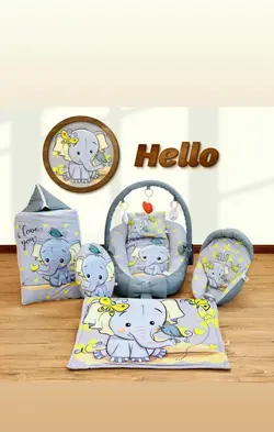 قیمت و خرید ست 7 تکه تشک بازی و غلتگیر مخمل طرح فیل وپروانه طوسی - سیسمونی آقابزرگ