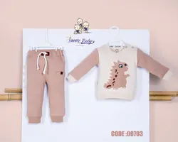 قیمت و خرید بلوز شلوار دایناسور کرم 703 آی نور - سیسمونی آقابزرگ