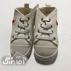 قیمت و خرید پاپوش نوزادی نیواستار سفید طرح پولو - سیسمونی آقابزرگ