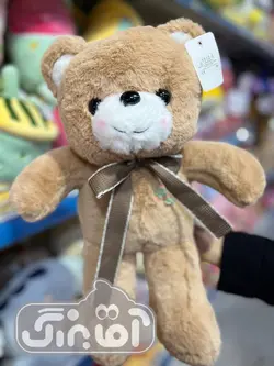قیمت و خرید عروسک پولیشی خرس گل به سینه - سیسمونی آقابزرگ