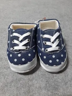 قیمت و خرید پاپوش نوزادی دخترانه تیتیل طرح خالخالی پاپیون - سیسمونی آقابزرگ