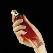 عطر زنانه دیواین قرمز اکسکلوسیو اوریفلیم