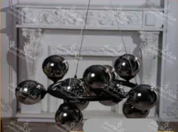 لوستر مولکولی ۱۲ شعله بدنه مشکی و حباب دودی ( ارسال 5 روز کاری )