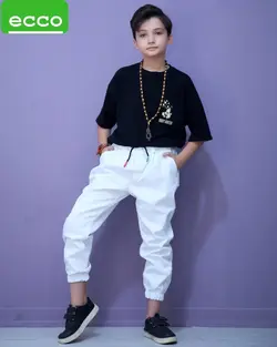 فروش عمده شلوار لی اسپرت سفید بچه گانه مدل دور کش مچ کش