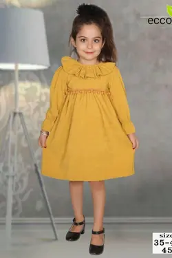 سارافون مخمل کبریتی طرح پوم پوم - عمده فروشی لباس بچه‌گانه اکوبازار