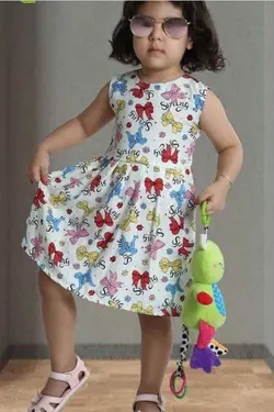 سارافون نخی عروسکی دخترانه طرح پاپیون - عمده فروشی لباس بچه‌گانه اکوبازار