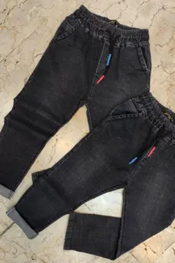 شلوار لی اسپرت زغالی طرح مام - عمده فروشی لباس بچه‌گانه اکوبازار