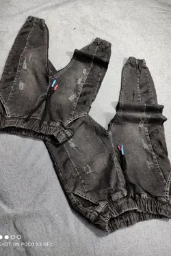 شلوار لی دورکش مچ کش بغل چاپ زغالی - عمده فروشی لباس بچه‌گانه اکوبازار