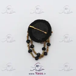 گل سینه جواهر دوزی مشکی طلایی آویز دار