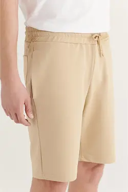 شلوارک راسته ساده جیب دار مردانه کرم آوا Avva (ساخت ترکیه)