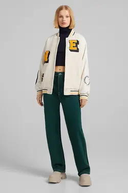 سویشرت کالج برش دار با آستین چرم مصنوعی زنانه رنگ سفید برشکا Bershka (ساخت اسپانیا)