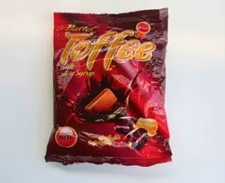 مينو    تافي كره اي با شيره خرما300گ24ب