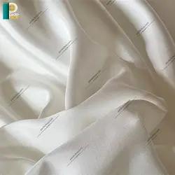 آستر پرده لوکس براق برند ماندگار رنگ شیری روشن همراه دوخت و نوار - پرده شاپ