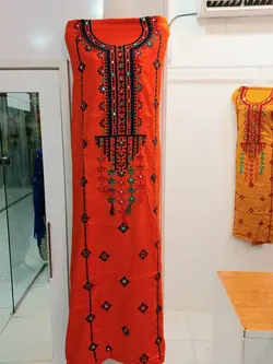 لباس بلوچی نخی منگوله‌دار رنگ نارنجی ml110