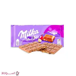 شکلات شیری میلکا مدل فندق و کشمش بسته 100 گرمی