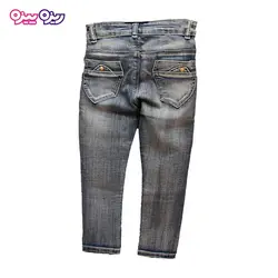 شلوار جین راسته نگین دار طرح دکمه طلایی کد 2234