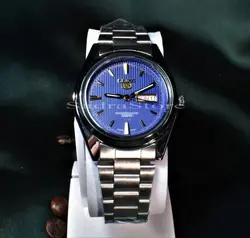( اتمام موجودی ) SEIKO 5 SK 300 موتور ژاپن سیکو موتور ژاپن &amp; کلا استیل ، با تقویم روزشمار و ایام هفته لاتین