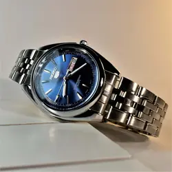 SEIKO 5 SK320 ساخت ژاپن سیکو موتور ژاپن &amp; کلا استیل ، با تقویم روزشمار وایام هفته لاتین با صفحه نفتی
