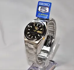 SEIKO 5 SNKC57 اتوماتیک خلبانی اورجینال ساخت ژاپن سیکو 5 اتومات موتور سیکو 21 سنگ اصل ** فول استیل ** 2 تقویم صفحه مشکی