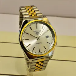 SEIKO 5 D6284 ساخت ژاپن سیکو موتور ژاپن دورنگ صفحه نقره ای ، فول استیل ، تقویم دار