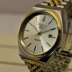 SEIKO 5 D6284 ساخت ژاپن سیکو موتور ژاپن دورنگ صفحه نقره ای ، فول استیل ، تقویم دار