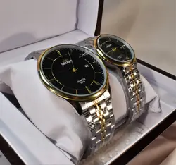 ORIENT WATCH موتور ژاپن (( موجود فقط مردانه ))  اورینت با موتور قدرتمند ژاپنی ** صفحه مشکی بند دورنگ با تقویم روز شمار ** درب استیل