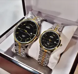 ORIENT WATCH موتور ژاپن (( موجود فقط مردانه ))  اورینت با موتور قدرتمند ژاپنی ** صفحه مشکی بند دورنگ با تقویم روز شمار ** درب استیل