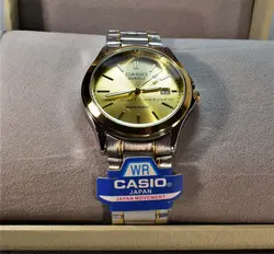 CASIO WATCH MTP1199  کاسیو با موتور قدرتمند میوتا ژاپن ** صفحه طلای ** درب استیل ** با تقویم روزشمار ** دورنگ