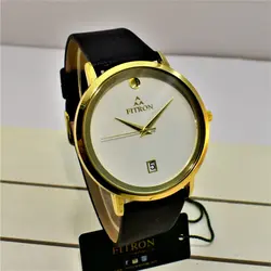 FITRON اورجینال ژاپن فیترون کلاسیک با صفحه ساده و تاریخ روز شمار * اصل ژاپن * بند مشکی باقاب طلایی صفحه سفید