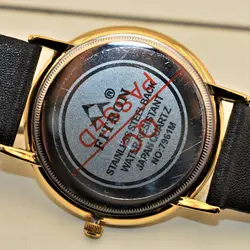 FITRON اورجینال ژاپن فیترون کلاسیک با صفحه ساده و تاریخ روز شمار * اصل ژاپن * بند مشکی باقاب طلایی صفحه سفید