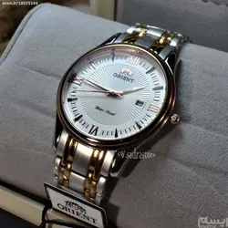ORIENT WATCH SHMZ-CU-B20030 ساخت ژاپن اورینت ژاپن ** صفحه سفید صدفی فرز شده ،، بند دورنگ بهمراه تقویم روز شمار ** فول استیل