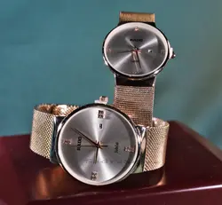 RADO WATCH jubile NO:8057 موتور ژاپن رادو ست زنانه مردانه نگین دار بهمراه تقویم ** طلایی درب استیل ضدآب 3ATM ** ساده بسیار جذاب