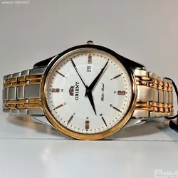 ORIENT WATCH SHM2-CO-BCA ساخت ژاپن اورینت ژاپن ** صفحه سفید صدفی فرز شده ،، بند دورنگ بهمراه تقویم روز شمار ** فول استیل