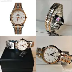 ORIENT WATCH SHM2-CO-BCA ساخت ژاپن اورینت ژاپن ** صفحه سفید صدفی فرز شده ،، بند دورنگ بهمراه تقویم روز شمار ** فول استیل