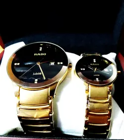 RADO WATCH jubile موتور ژاپن رادو ست زنانه مردانه نگین دار بهمراه تقویم ** طلایی درب استیل طرح سرامیک ** ساده بسیار جذاب
