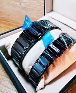 RADO WATCH jubile موتور ژاپن رادو ست زنانه مردانه موتورباکیفیت نگین دار بهمراه تقویم ** مشکی درب استیل طرح سرامیک **