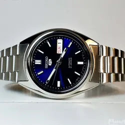 SEIKO5 SNXS77J1 - 7S26C اتوماتیک خلبانی اورجینال سیکو 5 اتومات اورجینال ژاپن موتور سیکو 21 سنگ اصل ** فول استیل ** 2 تقویم صفحه سرمه ای