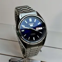 SEIKO5 SNXS77J1 - 7S26C اتوماتیک خلبانی اورجینال سیکو 5 اتومات اورجینال ژاپن موتور سیکو 21 سنگ اصل ** فول استیل ** 2 تقویم صفحه سرمه ای