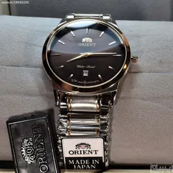 ORIENT WATCH DHM-CO-12089 ساخت ژاپن اورینت ژاپن ** صفحه شکلاتی ،، شیشه رنگی سافایر ،، بند دورنگ پین بند با تقویم روز شمار ** فول استیل