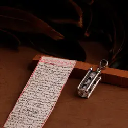 مدال نقره جا حرزی طرح قلعه با حرز امام جواد روی پوست آهو