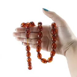 تسبیح پودر کهربا ۳۳ دانه عسلی با عطر لیمو کد T1058