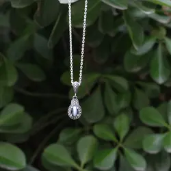 مدال نقره با نگین چشم گربه