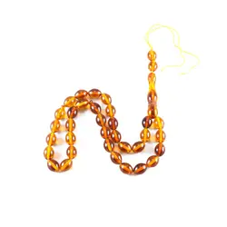 تسبیح پودر کهربا ۳۳ دانه عسلی با عطر لیمو کد T1036