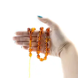 تسبیح پودر کهربا ۳۳ دانه عسلی با عطر لیمو کد T1036