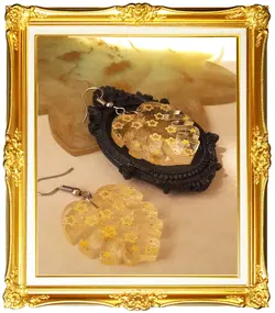 گوشواره برگ انجیری با تزیین ستاره های زرد