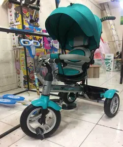 سه چرخه اسمارت رایک رده سنی ۳ تا ۷ سال چرخ بادی و صندلی چرخشی و سایبانر - بهار تویز