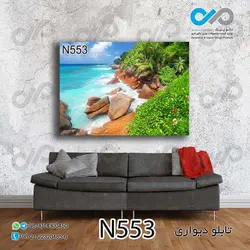 تابلو دیواری دکوپیک طبیعت با طرح سنگ ها وبوته های سبز کنار دریا- کد-N553 مستطیل افقی