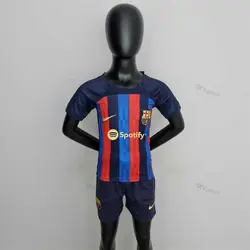 لباس بچه گانه بارسلونا 2023-2022 کیت اول