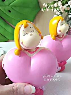 قلک و مجسمه دختر قلبی